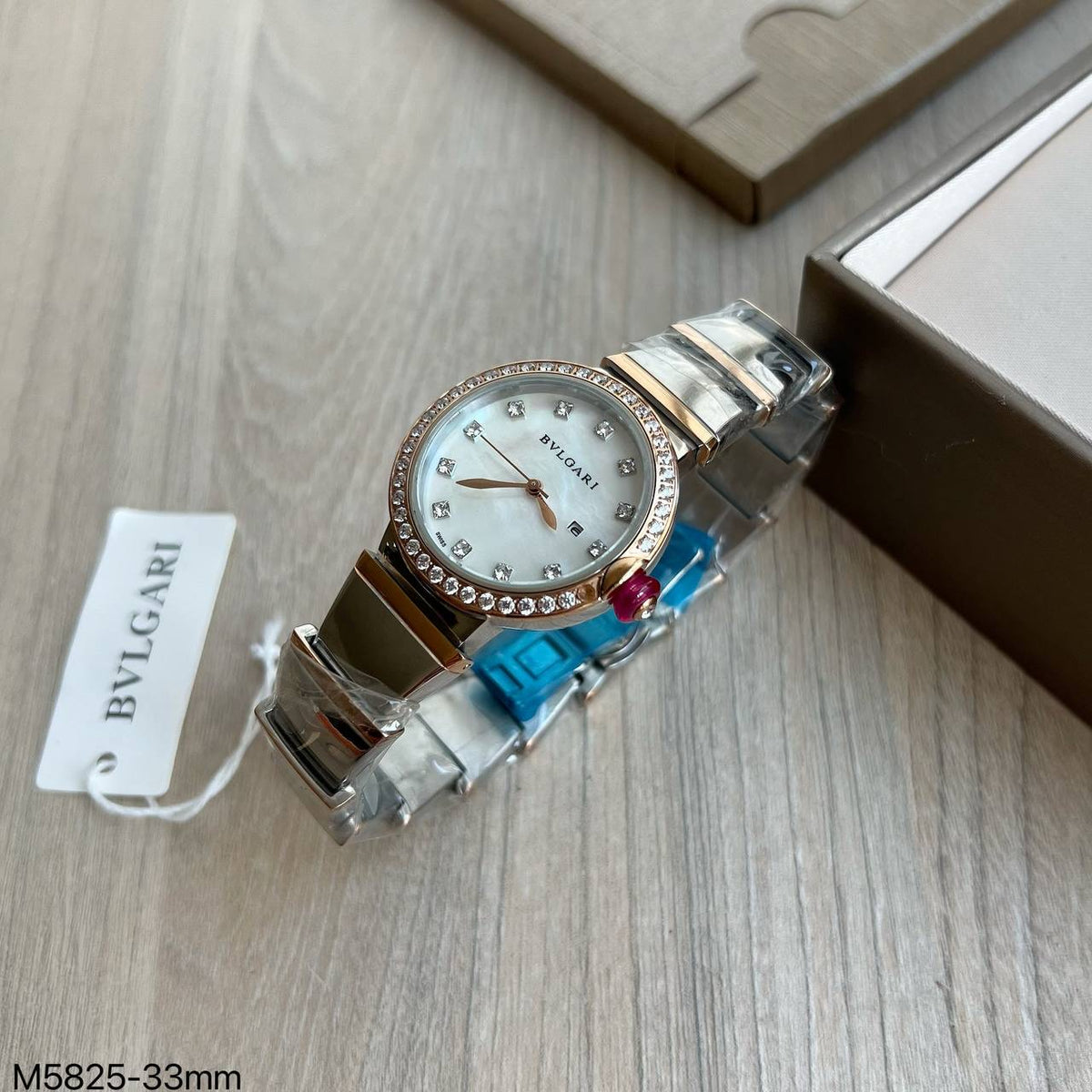BVLGARI LUCEA PRATA ROSE COM BRILHANTES 33MM FEMININO