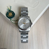 ROLEX OYSTER PERPETUAL PRATA FEMININO 36MM