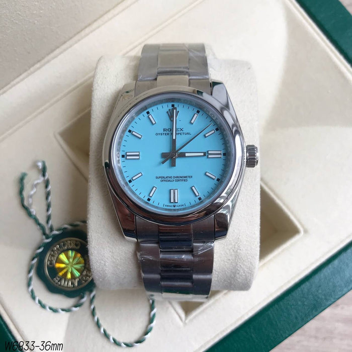 ROLEX OYSTER PERPETUAL PRATA TIFFANY FEMININO 36MM