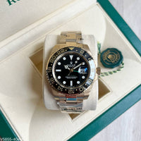 ROLEX GMT MASTER II DOURADO PRETO 40MM