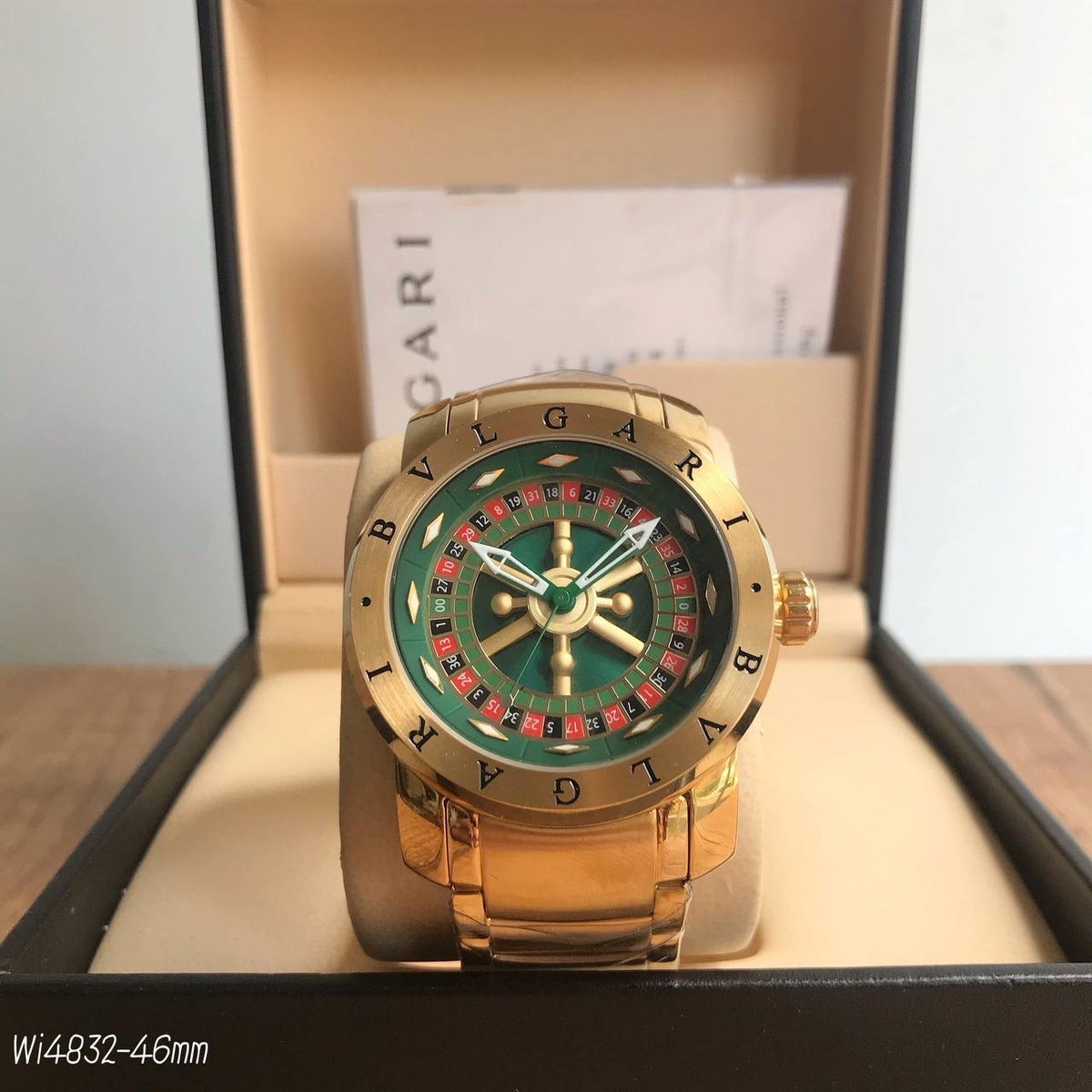 BVLGARI IRON MAN ROLETA DOURADO VERDE  44MM